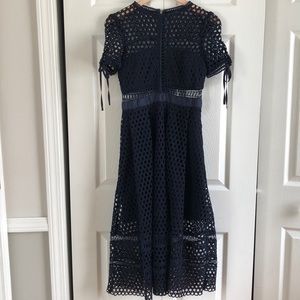 Navy blue fit-and-flare crochet cocktail dress